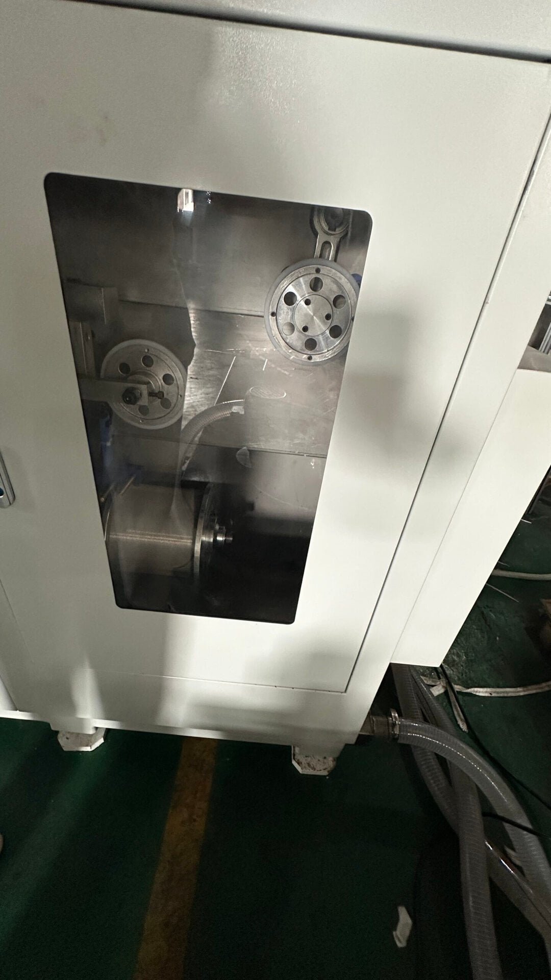 SOM200 wire spool compartment behind protective window