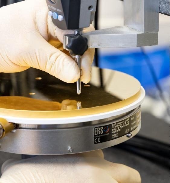 Contact probe inspecting a wafer surface